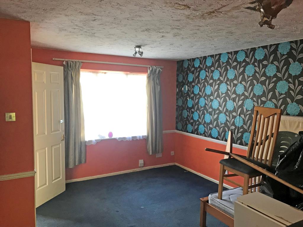 Lot: 73 - END-TERRACE THREE-BEDROOM HOUSE -